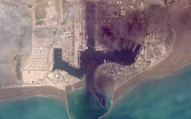 This satellite image from Planet Labs PBC shows fires burning on ships after a US military attack on a port in Bandar Abbas, Iran, March 2, 2026. (Planet Labs PBC via AP) This satellite image from Planet Labs PBC shows fires burning on ships after a US military attack on a port in Bandar Abbas, Iran, March 2, 2026. (Planet Labs PBC via AP)