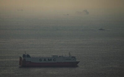 A cargo ship sails in the Arabian Gulf toward the Strait of Hormuz in the United Arab Emirates, March 19, 2026. (AP Photo)