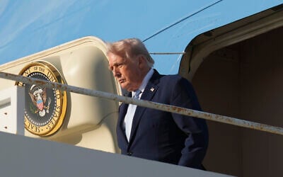 US President Donald Trump steps off Air Force One, March 20, 2026, at Palm Beach International Airport in West Palm Beach, Florida. (AP Photo/Mark Schiefelbein) US President Donald Trump steps off Air Force One, March 20, 2026, at Palm Beach International Airport in West Palm Beach, Florida. (AP Photo/Mark Schiefelbein)
