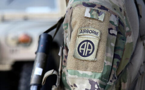 FILE - An 82nd Airborne Division paratrooper participates in artillery training during a field exercise at Fort Bragg, North Carolina, on Aug. 26, 2020. (AP Photo/Sarah Blake Morgan, File)