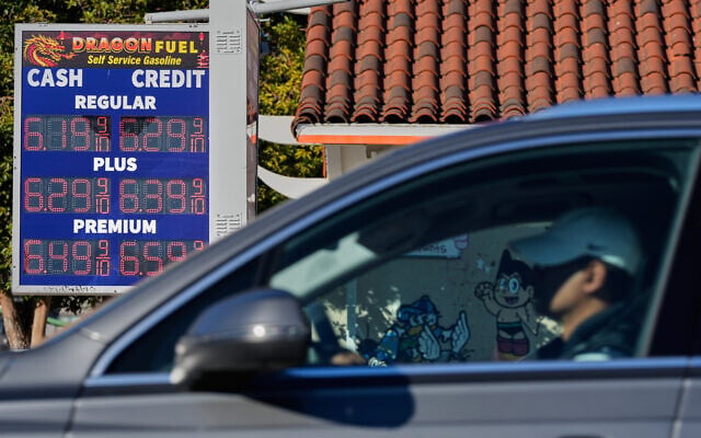 A motorist drives past a sign displaying prices at a gas station, in Oakland, California, March 24, 2026. (AP Photo/Godofredo A. Vásquez) A motorist drives past a sign displaying prices at a gas station, in Oakland, California, March 24, 2026. (AP Photo/Godofredo A. Vásquez)