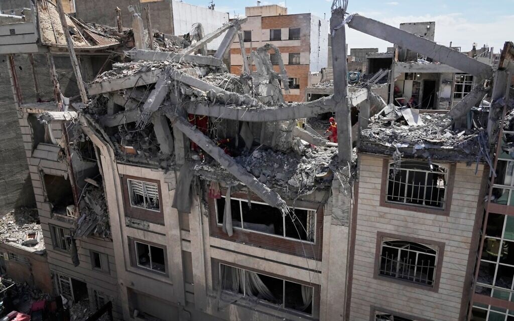 First responders inspect a building hit in a US-Israeli strike in Tehran, Iran, March 27, 2026. (AP Photo/Vahid Salemi) First responders inspect a building hit in a US-Israeli strike in Tehran, Iran, March 27, 2026. (AP Photo/Vahid Salemi)