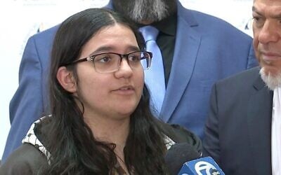 FILE - In this screengrab made from video provided by WXYZ-TV, Danielle Khalaf, who said she was humiliated by her teacher after declining to stand for the Pledge of Allegiance in protest of US support of Israel against Palestinians, appears at a news conference, February 27, 2025, in Detroit. (WXYZ-TV via AP, File)