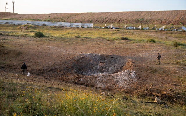 The site of an Iranian missile impact in an open area in Beersheba, March 29, 2026. (Emanuel Fabian/Times of Israel)