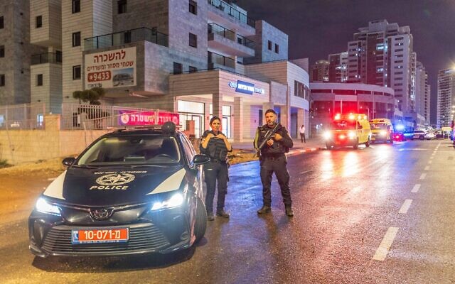 Illustrative: Officers block a road during a police raid in Ramle, October 1, 2023. (Yossi Aloni/Flash90) Illustrative: Officers block a road during a police raid in Ramle, October 1, 2023. (Yossi Aloni/Flash90)