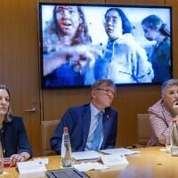 Spanish ambassador to Israel, Ana Salomon Perez, left, Per Egil Selvaag, Norwegian ambassador to Israel and Sonya McGuinness, Irish ambassador to Israel watching a movie of female soldiers being abducted on October 7, 2023, from Nahal Oz base at the Foreign Ministry in Jerusalem, after the three states called for Palestinian statehood. May 23, 2024. (Yonatan Sindel/Flash90)