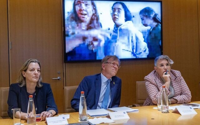 Spanish ambassador to Israel, Ana Salomon Perez, left, Per Egil Selvaag, Norwegian ambassador to Israel and Sonya McGuinness, Irish ambassador to Israel watching a movie of female soldiers being abducted on October 7, 2023, from Nahal Oz base at the Foreign Ministry in Jerusalem, after the three states called for Palestinian statehood. May 23, 2024. (Yonatan Sindel/Flash90)