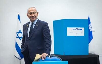 Prime Minister Benjamin Netanyahu and his wife Sara (not pictured) cast their vote during the elections for the Likud Central Committee, at the International Convention Center in Jerusalem, November 25, 2025. (Chaim Goldberg/Flash90)