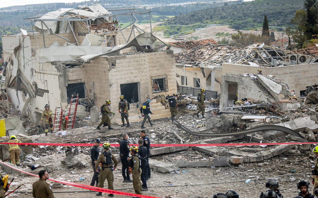 The scene where a ballistic missile fired from Iran hit Beit Shemesh, March 1, 2026. (Yonatan Sindel/Flash90)