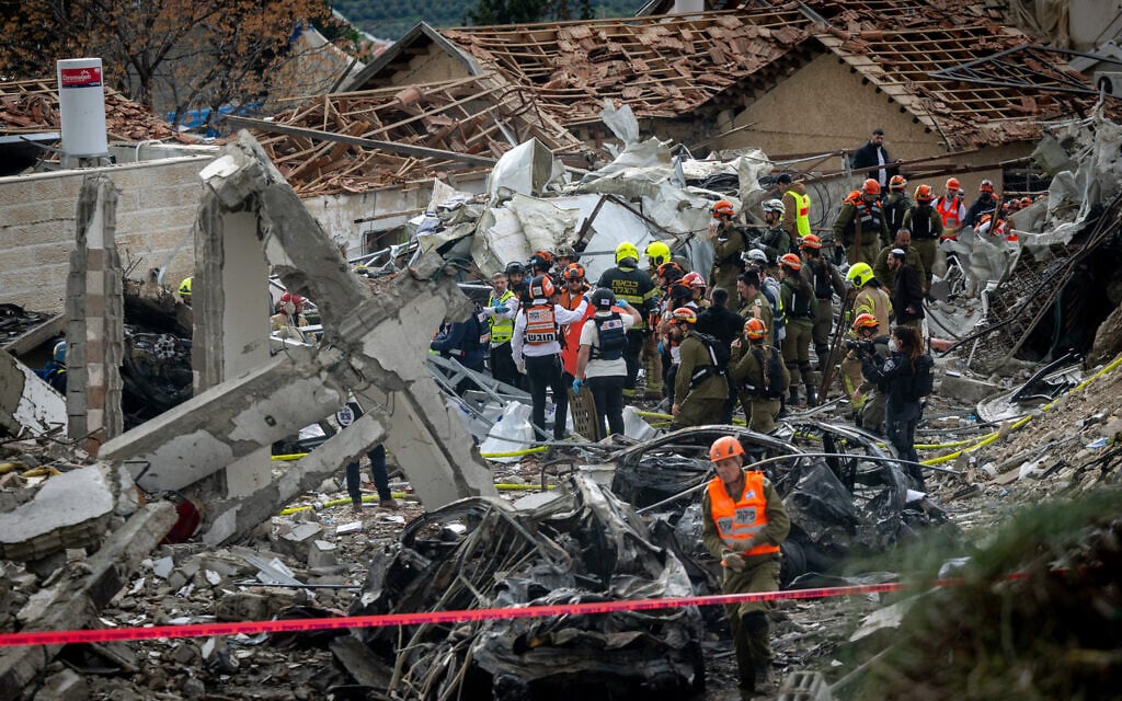 The scene where a ballistic missile fired from Iran hit Beit Shemesh, March 1, 2026. (Yonatan Sindel/Flash90)