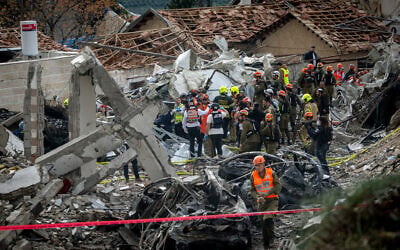 The scene where a ballistic missile fired from Iran hit Beit Shemesh, March 1, 2026. (Yonatan Sindel/Flash90)