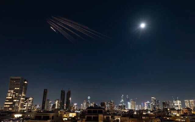 Submunitions from an Iranian cluster bomb warhead ballistic missile crash down on Israel, March 5, 2026. (Chaim Goldberg/Flash90) Submunitions from an Iranian cluster bomb warhead ballistic missile crash down on Israel, March 5, 2026. (Chaim Goldberg/Flash90)