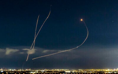 An Israeli missile defense system fires interceptors at missiles fired from Iran, as seen over central Israel, March 9, 2026. (Yossi Aloni/Flash90)