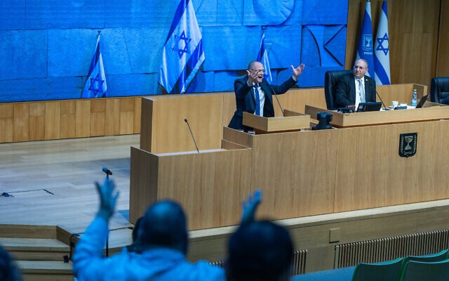 MK Oded Forer addresses a wartime plenum debate in the fortified Knesset auditorium, March 9, 2026. (Yonatan Sindel/Flash90) MK Oded Forer addresses a wartime plenum debate in the fortified Knesset auditorium, March 9, 2026. (Yonatan Sindel/Flash90)