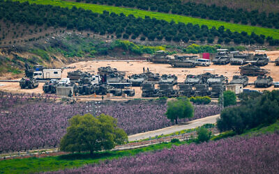 Israeli tanks and troops seen near the Lebanese border amid the ongoing war with Iran and Hezbollah, March 14, 2026. Ayal Margolin/Flash90) Israeli tanks and troops seen near the Lebanese border amid the ongoing war with Iran and Hezbollah, March 14, 2026. Ayal Margolin/Flash90)