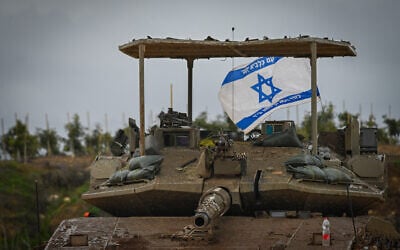 Israeli military vehicles and tanks are seen in Upper Galilee, northern Israel, amidst the ongoing war between Israel-US and Iran and Hezbollah, March 14, 2026. (Michael Giladi/Flash90) Israeli military vehicles and tanks are seen in Upper Galilee, northern Israel, amidst the ongoing war between Israel-US and Iran and Hezbollah, March 14, 2026. (Michael Giladi/Flash90)
