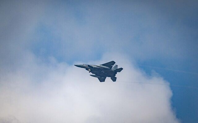 Israeli Air Force fighter jet seen above central Israel, March 15, 2026. (Nati Shohat/Flash90)