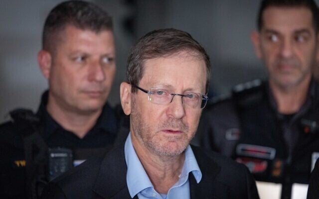 President Isaac Herzog and his wife Michal, at the scene where a missile fired from Iran at Israel caused damage to a house in Rishon Lezion, March 16, 2026. (Chaim Goldberg/ Flash90) President Isaac Herzog and his wife Michal, at the scene where a missile fired from Iran at Israel caused damage to a house in Rishon Lezion, March 16, 2026. (Chaim Goldberg/ Flash90)
