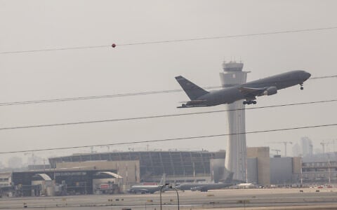 A plane departs from Ben Gurion Airport, March 16, 2026. (Yossi Aloni/Flash90)