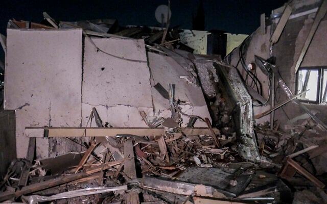 Damage is seen at a home hit by a rocket from Lebanon in Karmiel on March 17, 2026. (Flash90) Damage is seen at a home hit by a rocket from Lebanon in Karmiel on March 17, 2026. (Flash90)