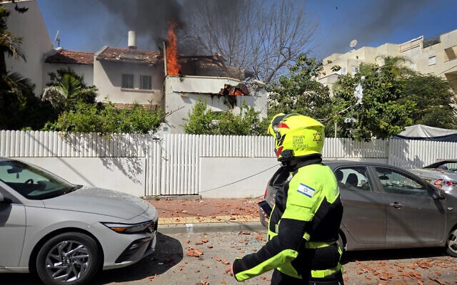 The site of an Iranian missile impact in Rehovot, Israel, on March 20, 2026. (Jonathan Shaul/FLASH90) The site of an Iranian missile impact in Rehovot, Israel, on March 20, 2026. (Jonathan Shaul/FLASH90)