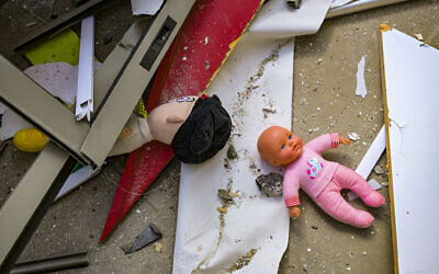 Israeli security and rescue forces at the scene where a daycare in Rishon Lezion, central Israel, was damaged by shrapnel from a ballistic missile fired from Iran at Israel, March 21, 2026. (Avshalom Sassoni/Flash90) Israeli security and rescue forces at the scene where a daycare in Rishon Lezion, central Israel, was damaged by shrapnel from a ballistic missile fired from Iran at Israel, March 21, 2026. (Avshalom Sassoni/Flash90)