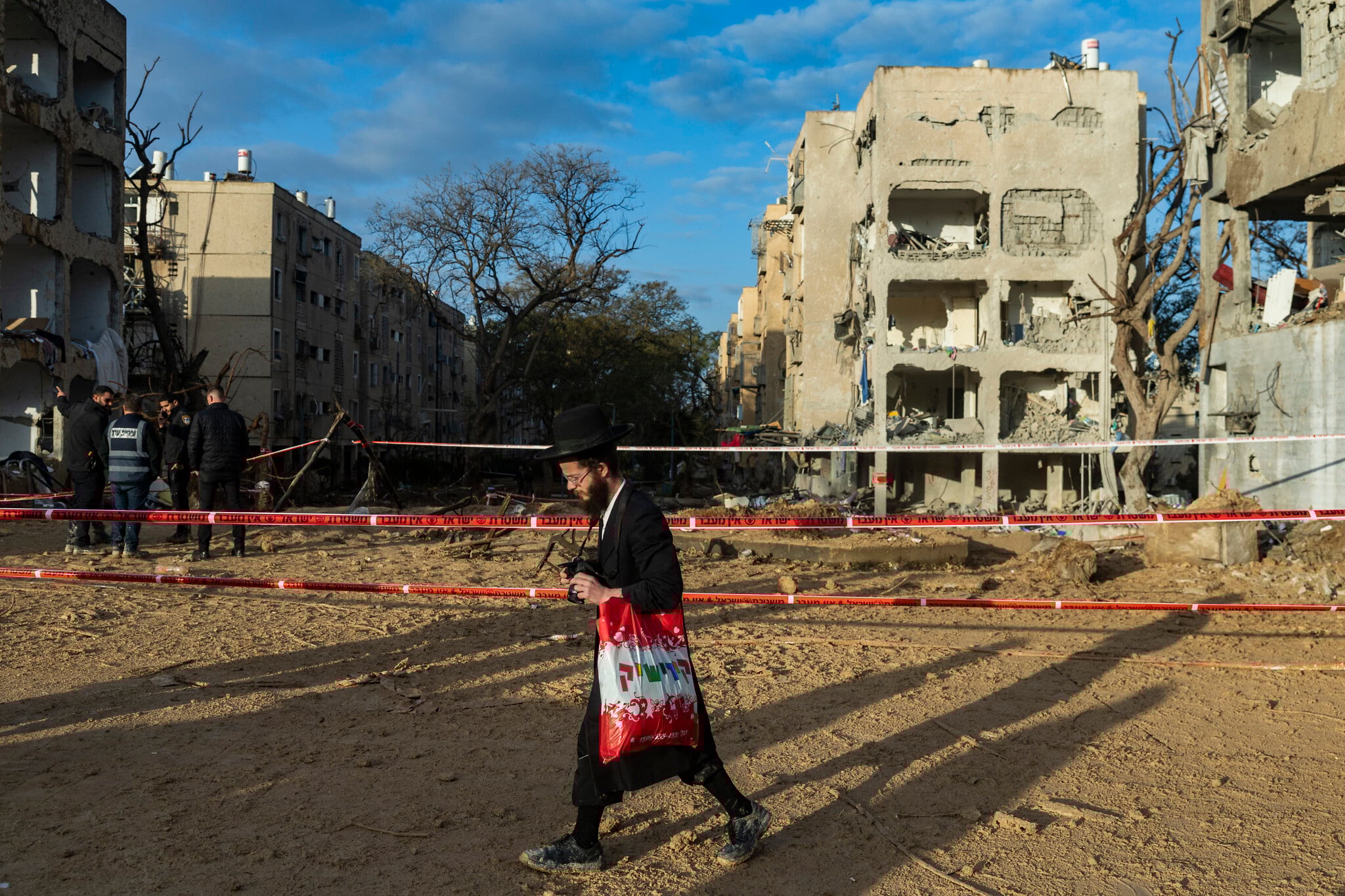 After a night of destruction, residents of Arad and Dimona begin picking up the pieces