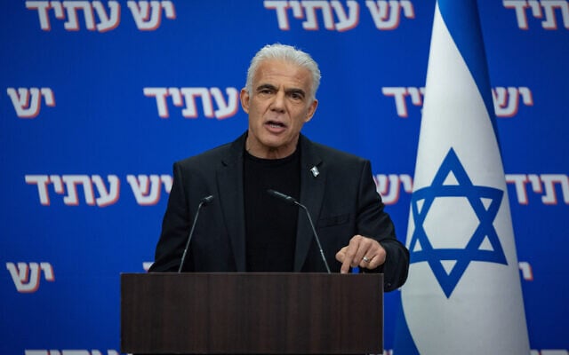 Opposition Yair Lapid leads a Yesh Atid faction meeting at the Knesset in Jerusalem, March 23, 2026. (Yonatan Sindel/Flash90