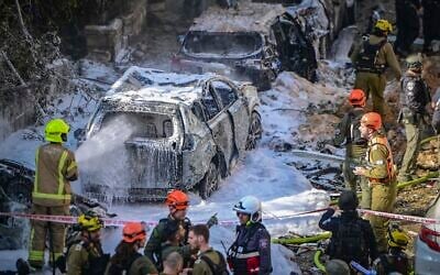 Security and rescue forces respond at the site of an Iranian missile strike in Tel Aviv, Tuesday, March 24, 2026. (AP/Ohad Zwigenberg)