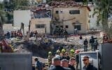 Rescue services at the scene of an Iranian ballistic missile impact in Eshtaol, March 28, 2026. (Oren Ben Hakoon/Flash90)