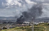 Smoke rises from the Bazan oil refinery in Haifa, following missile attacks from Iran and Lebanon, March 30, 2026. (Anthony Hershko/Flash90)