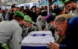 Family and friends of slain IDF soldier Cpt. Noam Madmoni attend his funeral at the Sderot Military Cemetery, March 31, 2026. (Tsafrir Abayov/Flash90)