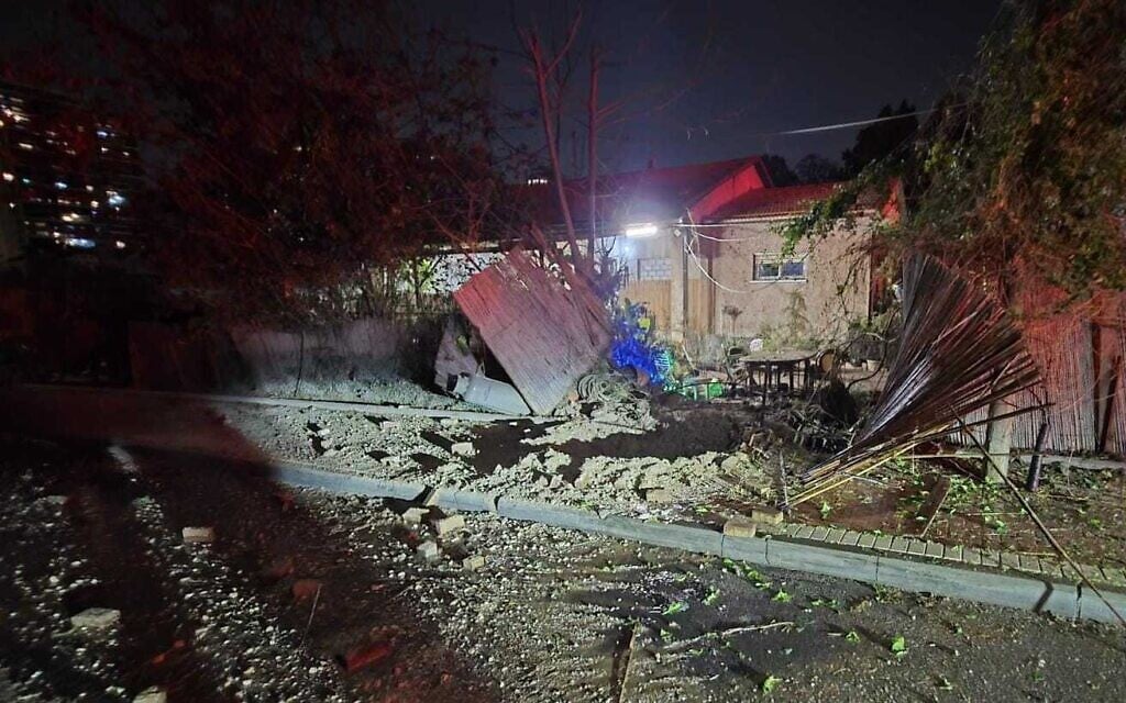 Iranian cluster missile impacts cause damage but no injuries in central Israel