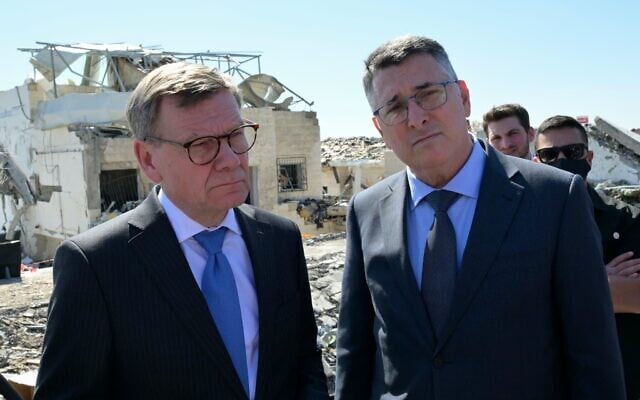 Foreign Minister Gideon Sa'ar, right, and German Foreign Minister Johann Wadephul visit the site of a deadly Iranian missile impact days earlier in Beit Shemesh, March 10, 2026. (Shlomi Amsalem/GPO) Foreign Minister Gideon Sa'ar, right, and German Foreign Minister Johann Wadephul visit the site of a deadly Iranian missile impact days earlier in Beit Shemesh, March 10, 2026. (Shlomi Amsalem/GPO)
