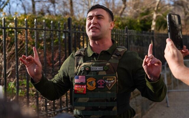 Far-right influencer Jake Lang speaks in front of Gracie Mansion at a protest he organized on March 9, 2026, in New York City. (Ryan Murphy/Getty Images via JTA)