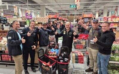 Purim at Supermarket: Brotherhood Mission participants purchased groceries and packed Purim care packages for soldiers and families in need