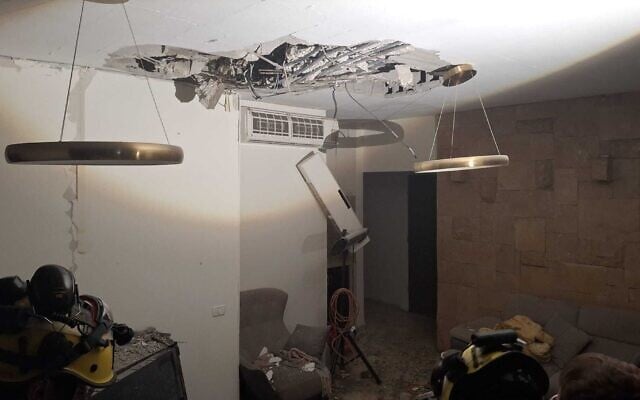 Damage caused to a home in the northern town of Bi'ina following an impact of a Hezbollah rocket, March 11, 2026. (Fire and Rescue Service)