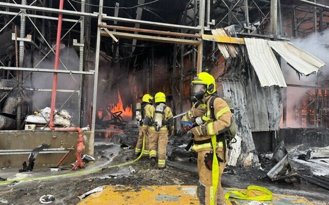 Firefighters work to extinguish a blaze caused by an Iranian missile at the Neot Hovav industrial zone, near Beersheba, March 29, 2026. (Fire and Rescue Service)