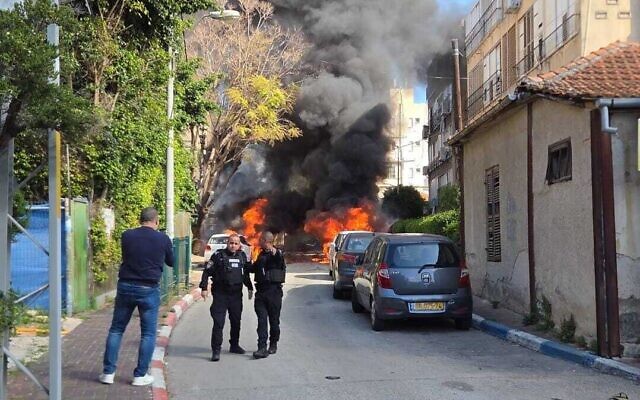Cars are on fire after impacts from an Iranian missile in central Israel, March 31, 2026 (Hatzalah) Cars are on fire after impacts from an Iranian missile in central Israel, March 31, 2026 (Hatzalah)