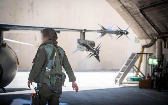 A female Israeli Air Force pilot is seen ahead of strikes in Iran, in a photo issued by the military on March 2, 2026. (Israel Defense Forces)