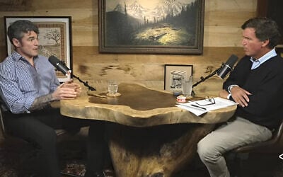 Joe Kent (l) sits for an interview with Tucker Carlson a day after resigning as director of President Trump's National Counterterrorism Center, March 18, 2026. (Screenshot via YouTube/ via JTA) Joe Kent (l) sits for an interview with Tucker Carlson a day after resigning as director of President Trump's National Counterterrorism Center, March 18, 2026. (Screenshot via YouTube/ via JTA)