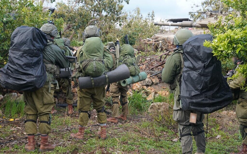 IDF troops of the 226th Reserve Paratroopers Brigade operate in southern Lebanon, in a handout photo issued by the military on March 29, 2026. (Israel Defense Forces)