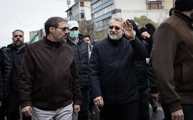 Ali Larijani (waving) participates in a Quds Day anti-Israel march in Tehran on March 13, 2026, the last time has seen alive in public. (X, used in accordance with clause 27a of the copyright law) Ali Larijani (waving) participates in a Quds Day anti-Israel march in Tehran on March 13, 2026, the last time has seen alive in public. (X, used in accordance with clause 27a of the copyright law)