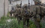 Soldiers of the Commando Brigade operate in the southern Lebanon town of Bint Jbeil, in a handout photo issued by the military on April 13, 2026. (Israel Defense Forces)