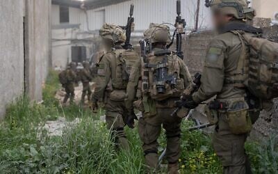 Soldiers of the Commando Brigade operate in the southern Lebanon town of Bint Jbeil, in a handout photo issued by the military on April 13, 2026. (Israel Defense Forces)