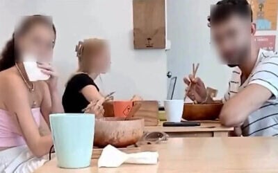 An Israeli man and woman look at the camera of an antisemitic abuser in a restaurant in Vietnam in an undated video that has gone viral on social media. (Screen capture: X, used in accordance with Clause 27a of the Copyright Law) An Israeli man and woman look at the camera of an antisemitic abuser in a restaurant in Vietnam in an undated video that has gone viral on social media. (Screen capture: X, used in accordance with Clause 27a of the Copyright Law)