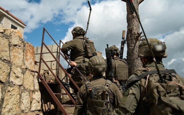 Soldiers of the Givati Brigade operate in the southern Lebanon town of Bint Jbeil, in a handout photo issued by the military on April 14, 2026. (Israel Defense Forces)