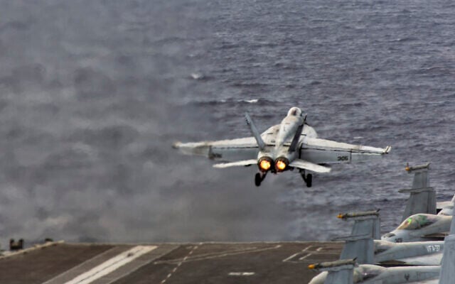 FILE: An F/A-18E Super Hornet aircraft, attached to Strike Fighter Squadron 31, launches from the flight deck of the USS Gerald R. Ford (CVN 78), while underway during Operation Epic Fury, March 15, 2026. (US Navy photo)