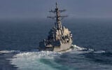 An Arleigh Burke-class guided-missile destroyer USS Frank E. Petersen Jr. (DDG 121) sails in the Arabian Sea during Operation Epic Fury, March 18, 2026. (US Navy photo)