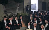 Haredi extremists protesting the arrest of a draft evader break into the backyard of the house of Military Police chief Brig. Gen. Yuval Yamin in Ashkelon, April 28, 2026. (Israel Police)